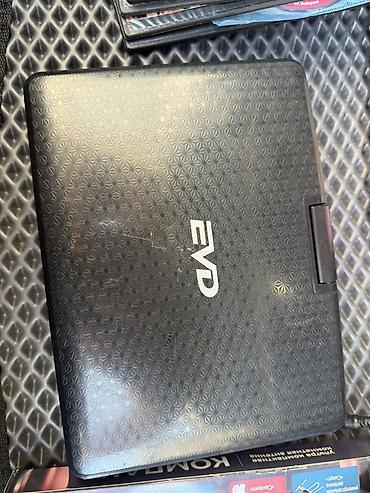 dvd video player: Портативный DVD-плеер EVD + комплект дисков и ТВ-приставка Состав — 4