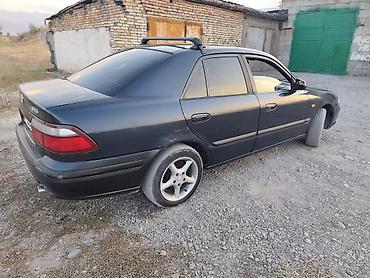 12 t: Mazda 626: 1997 г., 1.8 л, Механика, Бензин, Седан — 9