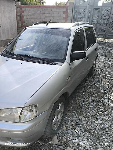 Mazda: Mazda Demio: 2001 г., 1.5 л, Кол менен иштөөчү, Бензин, Универсал — 2