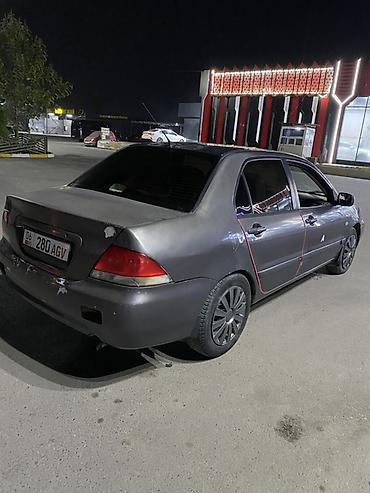 Mitsubishi: Mitsubishi Lancer: 2005 г., 1.6 л, Механика, Бензин, Седан — 6