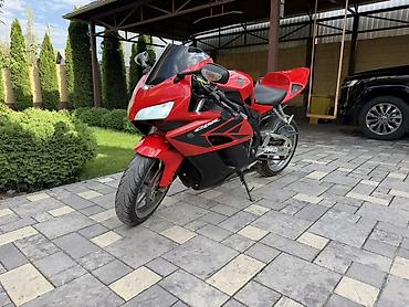 хонда сбр 600 рр: Honda CBR1000 — спортивный мотоцикл в красно‑черной раскраске. Год — 3