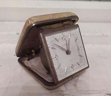 saat casio: EUROPA səyahət saatı –1950 çi il mexaniki, qutu tipli model - Brend — 1