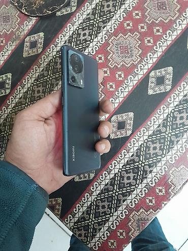 ipad 13: Xiaomi 13 Lite, 128 GB, rəng - Narıncı, 
 Barmaq izi, İki sim kartlı, Face ID — 6