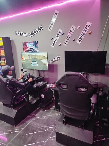 PS5 (Sony PlayStation 5): - PlayStation 5 oyun zonaları: böyük divar TV-ləri, rahat oturacaqlar — 1