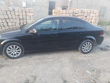 Opel: Opel Astra sedan - Kuzov: 4 qapılı sedan, qara rəng - Salon: parça — 4