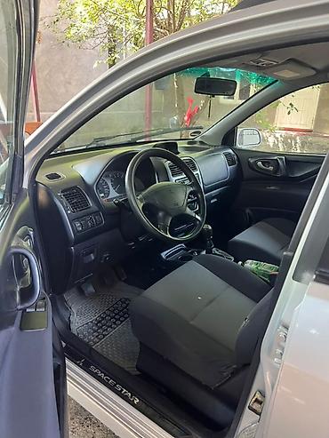 Mitsubishi: Mitsubishi Space Star: 2002 г., Хэтчбэк — 9