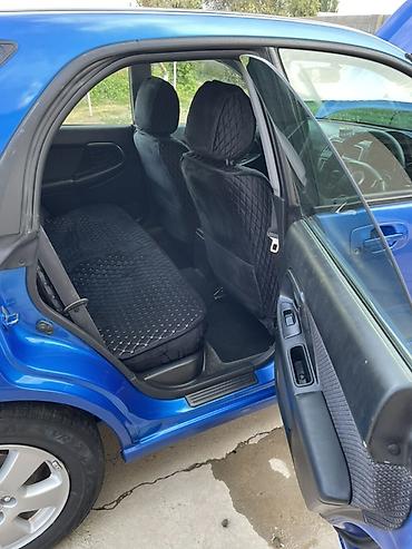 выхлопы: Subaru Impreza: 2000 г., 1.5 л, Автомат, Хэтчбэк — 9