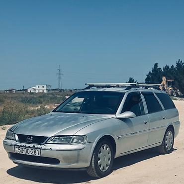 авто фольксваген: Opel Vectra Caravan (Universal) – gümüşü rəng - Kuzov: universal (5 — 1