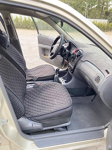 Mazda: Mazda 323: 1998 г., 1.5 л, Механика, Бензин, Седан — 12