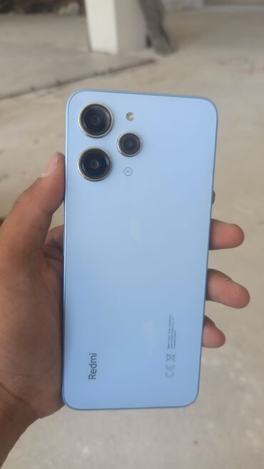 телефон пока x3: Xiaomi, Redmi 12, Новый, 256 ГБ, цвет - Голубой, 2 SIM