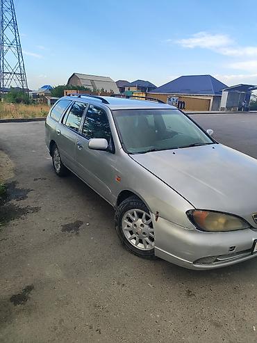 премия: Nissan Primera: 1999 г., 2 л, Автомат, Бензин, Универсал — 1