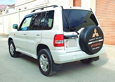 pajero tekeri: Mitsubishi Pajero iO 4WD – ağ rəngli, kompakt off-road SUV Maşına — 5