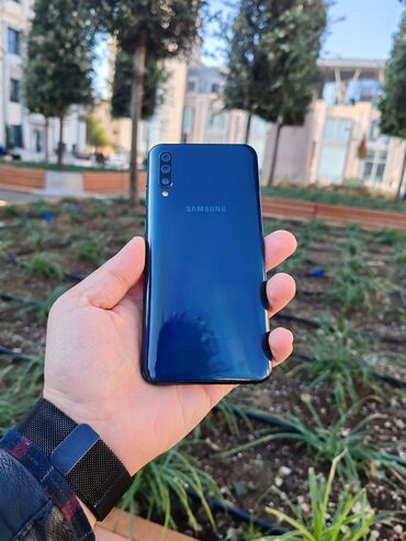 samsung a51 qiymeti irşad: Samsung Galaxy A50, 64 GB, rəng - Qara, Zəmanət, İki sim kartlı