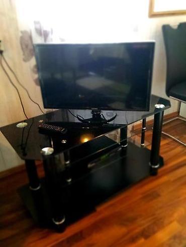 kunc ref: Şüşə TV stendi teze kimidihal hazirda sokuludu deye oz sekili yoxdu — 2