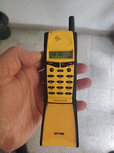 samsung dostava: Ericsson GF768 – žuti flip GSM telefon, baterija nova, punjač - — 2