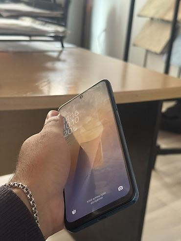 macbook air m3: Xiaomi Redmi smartfon - Model: Redmi (şəkillərdə mavi rəng, arxa — 3