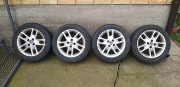 celicne felne 16 5x112: Prodajem 4 alu felne sa M+S gumama. WINTER 185/55 R15 82T Gume su