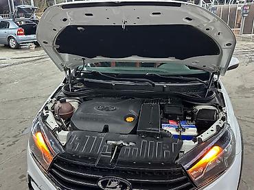 corolla cros: Lada Vesta SW Cross – ağ rəngli, şəhər və ailə istifadəsi üçün praktik — 10
