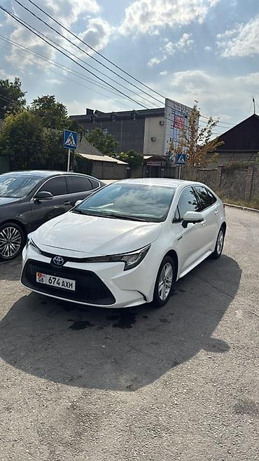 mark x: Toyota Corolla: 2022 г., 1.8 л, Гибрид, Седан — 1