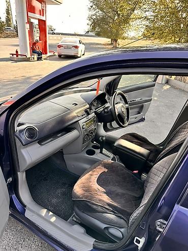 camry 5: Mazda Demio: 2004 г., 1.5 л, Автомат, Бензин, Хэтчбэк — 9