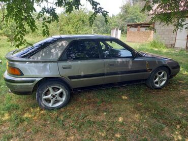 мазда 323 ефка: Mazda 323: 1991 г., 1.6 л, Механика, Бензин, Хэтчбэк