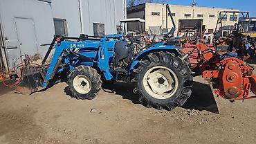 Другие мини-тракторы: Компактные колёсные тракторы с навесным оборудованием Описание: - — 6