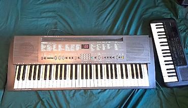динамики: Электронный синтезатор Yamaha PSR-300 (61 клавиша)  Идеальный — 1