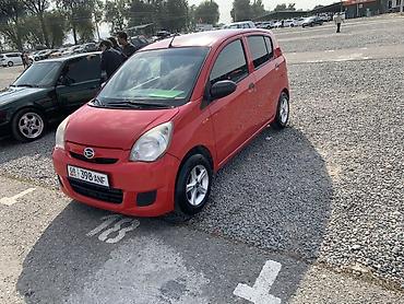 265 70: Daihatsu Cuore: 2009 г., 1 л, Механика, Бензин, Хэтчбэк — 3