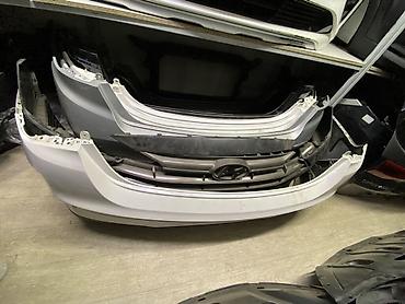 Передний бампер Hyundai с решеткой радиатора - Оригинальный бампер