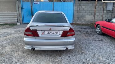 Mitsubishi: Mitsubishi Lancer: 1996 г., 1.3 л, Механика, Бензин, Седан