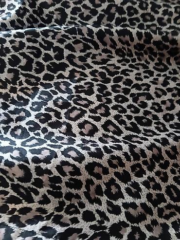 Haljine: Haljina s leopard printom i korset vezivanjem - Model: midi haljina — 3