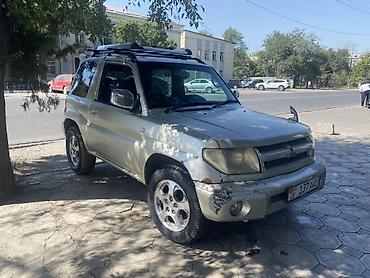 поджеро ио: Mitsubishi Pajero iO: 1999 г., 1.8 л, Автомат, Бензин, Внедорожник — 8
