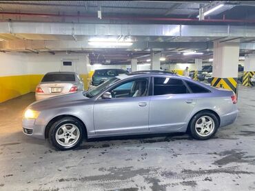 ауди 100 с4 универсал купить: Audi A6 серебристого цвета с люком на крыше. Салон автомобиля оснащен