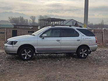 для авто: Nissan R Nessa: 1998 г., 2.4 л, Автомат, Бензин, Универсал — 1