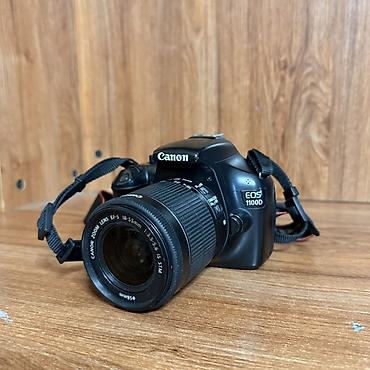 se electronics: Зеркальная камера Canon EOS 1100D с комплектом оптики и сумкой — 1