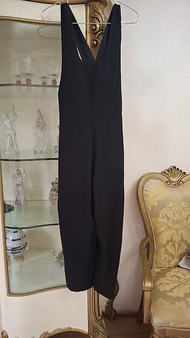 cins kombinzon: Sisley brendinin qadın üçün qara kombinezonu. - Model: dərin — 4