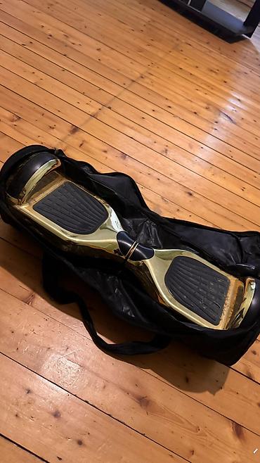 Giroskuterlər: Qızılı rəngdə iki təkərli hoverboard (self-balance skuter) — 1