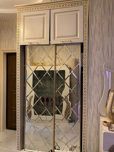 ucuz qaplar: Dehliz dolabı. 300azn. ideal veziyyetde. ölçü 320/110sm. ünvan