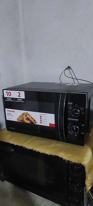 pelet sobası: Toshiba mikrodalğalı soba – mexaniki idarəetmə, qara korpus, ön şüşə — 1
