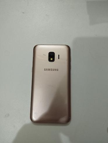 ses ucaldan: Samsung Galaxy J2 Core, 8 GB, rəng - Qızılı — 2