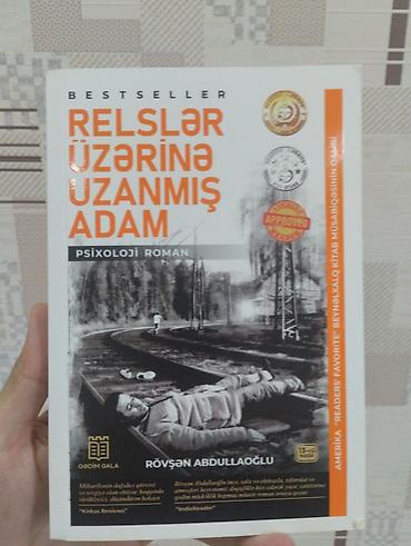 Художественная литература: Relslər üzərinə uzanmış adam – psixoloji roman Müəllif: Rövsən — 1