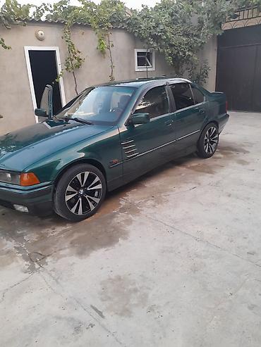 s class fara: BMW sedan, yaşıl-mavi (tünd petrol) rəng. E36 kuzov. - 4 qapı, salon — 8