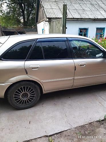 e53 amg: Mazda Familia: 2002 г., 1.6 л, Универсал — 3