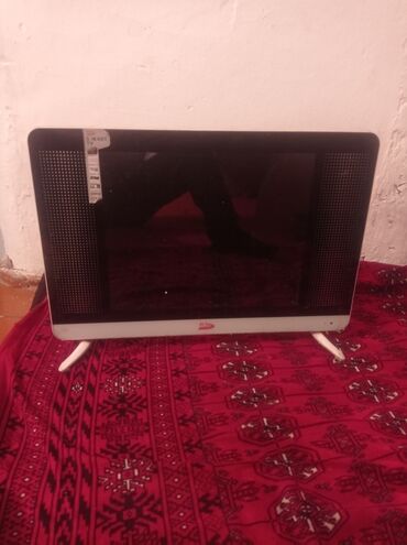телевизор samsung ue40h5270: Компактный телевизор Daewoo с экраном в черном корпусе и белой нижней