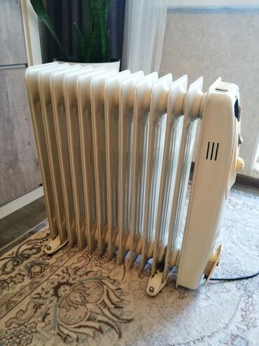 проточный обогреватель: Масляный обогреватель Кол-во секций: 10 и более, Несколько режимов мощности