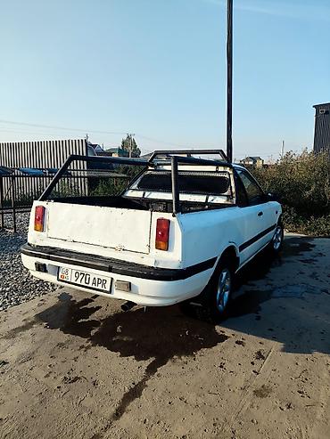 иж пикап: Mazda 323: 1990 г., 1.6 л, Механика, Бензин, Пикап — 3