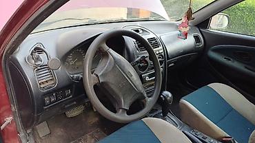 Транспорт: Mitsubishi Carisma: 1989 г., Автомат, Бензин, Седан — 4