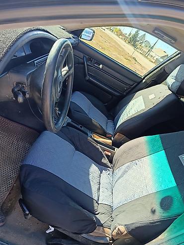 Audi 100: 1991 г., 2.6 л, Механика, Газ, Седан