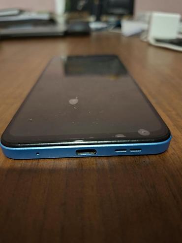 Мобильные телефоны и аксессуары: Redmi 12, 128 ГБ, цвет - Голубой, Отпечаток пальца, Face ID — 6