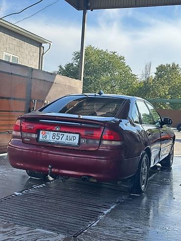 твикис диска: Mazda 626: 1997 г., 2 л, Автомат, Бензин, Седан — 2